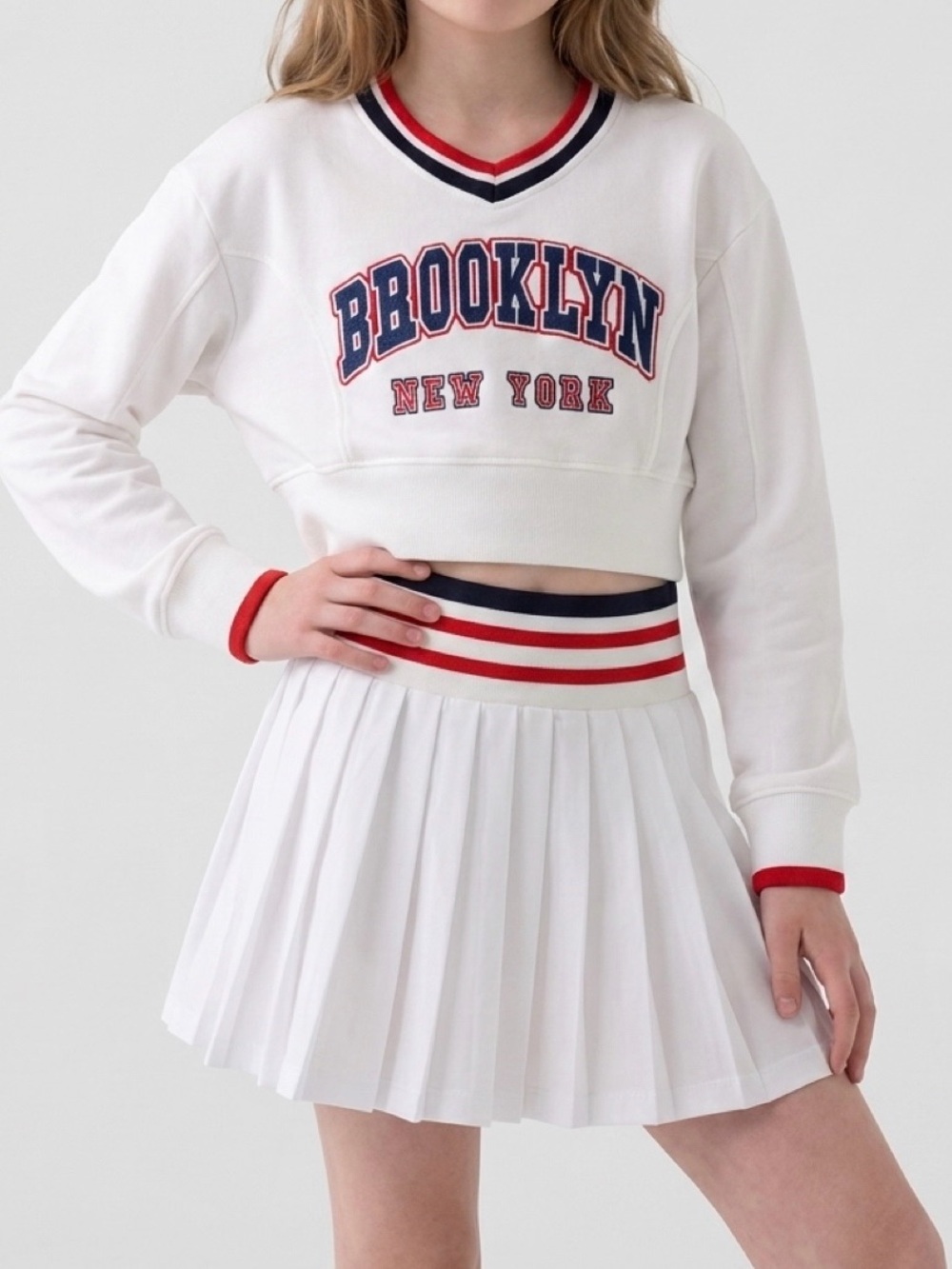 Girls' White Pleated Skirt with Red & Navy Striped Waistband